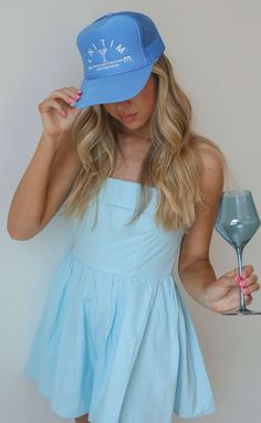 Preorder tees and sweatshirts ship out within 2-12 business days and preorder hats can take up to 15 business days to ship. It's always 'tini time! The perfect ocean blue trucker hat for cocktail hour, vacation or any fun event in between. We love the crisp white stitching featuring a tiny dirty martini! Use code BACH20 for 20% off an order of 6+ items from the bridal collection. Some exclusions apply. ALL HATS ARE FINAL SALE! Blue Curved Bill Trucker Hat For Spring, Blue Trucker Hat With Curved Bill For Spring, Blue Trucker Hat, Dirty Martini, Fun Events, Embroidered Sweatshirts, Cocktail Hour, Ocean Blue, Bridal Collection