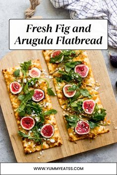 fresh fig and arugula flatbread on a cutting board