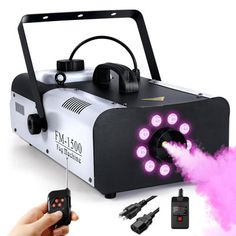 Enhance your event with a powerful fog machine that delivers impressive 15000 cuft/min of dense, atmospheric smoke up to 8 meters. With 1500W of power and a compact 2.5L tank (Water Based), it's efficient and effective. Control it effortlessly via a dual wired and wireless remote control. The wireless remote control works from 25 meters of distance. Built with durable iron with anti rust coating on top, this indoor outdoor fog machine operates on AC110V/220V and features only 5 to 8 minutes of p Fog Machine Cooler, Fogger Machine, Low Lying Fog, Christmas Stage, Fog Machine, Wet Dry Vacuum, Rgb Led Lights, Bright Led Lights, Music Event