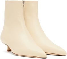 Ankle-high LWG-certified grained nappa leather boots in off-white. · Pointed toe · Zip closure at inner side · Red stitch at heel tab · Grained lambskin lining · Kitten heel with rubber injection · Nubuck sole with rubber injection · Heel: H1.25 Supplier color: Creamy Cream Leather High Ankle Boots, High Ankle Cream Leather Boots, Cream Calf Leather Boots With Reinforced Heel, Cream Leather High Ankle Heeled Boots, Cream High Ankle Heeled Leather Boots, Beige Calf Leather Boots With Sculpted Heel, Cream Pointed Toe Calf Leather Boots, Cream Pointed-toe Calf Leather Boots, Cream Round Toe Heeled Boots In Calf Leather