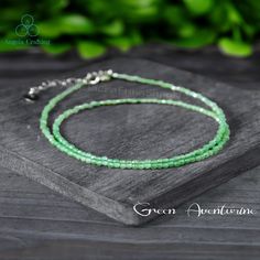 Green Aventurine Crystal Choker Necklace, Healing Crystal Aventurine Choker, Natural Gemstone Dainty Choker, Minimalist Choker Gift Beads Size: 2 mm approx. Length:15" +2" approx. 🥰 A lovely natural green aventurine gemstone beaded necklace is perfect for your loved one or yourself! Made with love just for you! Necklace measures around 15 inches plus 2 inches of extender chain. The clasp and finish is stainless steel with a little silver hematite stone that hangs from the end of the extender ch Aventurine Gemstone Beaded Necklace As Gift, Minimalist Green Gemstone Beads Jewelry, Aventurine Gemstone Necklace For May Birthstone, Green Aventurine Gemstone Crystal Necklaces, Green Aventurine Gemstone Crystal Necklace, Aventurine Jewelry With Natural Stones For May Birthstone, Aventurine Natural Stones Jewelry For May Birthstone, Emerald Necklace With Natural Aventurine Stones As Gift, Gift Green Amazonite Crystal Necklace