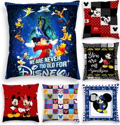 four pillows with mickey mouse and other disney characters on them, all in different colors