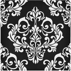 a black and white wallpaper with an ornate design