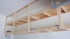 the garage shelvings are being built in order to fit into the space under the ceiling