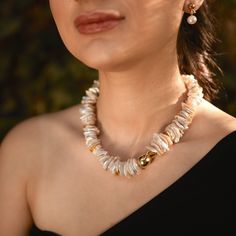 This freshwater keshi pearl necklace is meticulously crafted from exceptionally unique and unusually shaped natural keshi pearls, ranging in size from 14mm to 22mm, each of which is drilled through the center.  The centerpiece of this statement necklace is a 14k gold-plated large baroque pearl, complemented by a delightful assortment of stacked Keshi pearls. These Chinese keshi pearls have a lovely beige tone and feature various colors, primarily white, among them. Hopefully, you will love this Baroque Pearl Necklace With Natural Stones As Gift, Unique White Baroque Pearl Jewelry, Single Strand Mother Of Pearl Necklace Gift, Single Strand Mother Of Pearl Necklace For Gift, Keshi Pearl Necklace, Necklace Ideas, Unique Birthday Gifts, Keshi Pearls, Pearl Choker