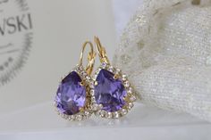 PURPLE WEDDING JEWELRY, Purple Crystal Earrings, Lilac Purple Earrings,Small Dangle Drop Earrings,Light Purple Rhinestone Earrings . Details of item: Metal: 24K Gold Plated ( yellow or rose) or Silver - Nickel Free Length: 16* 12 mm The earrings will be packed in a gift box. , FOR MY EARRINGS COLLECTION HERE: https://www.etsy.com/il-en/shop/rebekajewelry?section_id=14222612&ref=shopsection_leftnav_3 TO GET TO MY ETSY SHOP: https://www.etsy.com/il-en/shop/rebekajewelry THANK YOU CHOOSING MY E Purple Rhinestone Earrings For Wedding, Teardrop Jeweled Bridal Earrings For Wedding, Elegant Purple Rhinestone Crystal Earrings, Purple Teardrop Earrings For Wedding, Elegant Purple Wedding Earrings, Purple Wedding Jewelry, Jewelry Purple, Purple Earrings, Purple Rhinestone