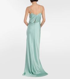 Look to Max Mara for understated elegance such as the Selce maxi dress. Made from lustrous satin in a turquoise hue, the slip design hangs by slim straps and fastens with an invisible zipper at the back..Made in Italy.Material: 29% viscose, 71% acetate.Closure: zipped back, buttoned back.Lining: 10% silk, 85% acetate, 5% polyamide.Care instructions: dry clean.True to size.Cinched waist.Mid-weight material.DT = German size.The model seen in the picture is 178cm-5'10' and wearing a size DT 34 Full Length Satin Slip Dress, Full-length Satin Slip Dress, Full Length Satin Slip Dress For Evening, Full-length Satin Slip Dress For Evening, Green Bias-cut Maxi Length Slip Dress, Green Bias Cut Maxi Length Slip Dress, Elegant Green Floor-length Slip Dress, Green Floor-length Satin Slip Dress, Green Floor-length Slip Dress With Bias Cut