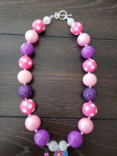 Fun Pink Beaded Necklace For Gift, Fun Pink Necklace For Birthday, Fun Pink Beaded Necklaces For Gifts, Playful Pink Necklace With Colorful Beads, Cute Purple Beaded Necklace, Playful Adjustable Purple Necklace, Adjustable Purple Playful Necklace, Playful Pink Beaded Necklaces For Birthdays, Fun Birthday Beaded Necklaces With Round Beads