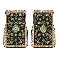 two black and green rugs with flowers on them