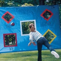 Hang a tarp between two trees and cut shapes out so the kids can practice their throwing motions. | 32 Cheap And Easy Backyard Ideas That Are BorderlineGenius Outside Games, Outdoor Games For Kids, Yard Games, Backyard Games, Carnival Games, Birthday Party Games, Backyard Fun, Outdoor Games, Sports Theme