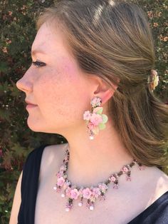 Gorgeous dangle drop earrings made with hand painted resin flowers and glass beads. The colors are lovely faded pinks complimented with pretty mint green. Earrings can be pierced or clip and. go beautifully with the candy pink necklaces in this collection, links below. This is a quality piece of jewelry that will last a life time. Created by designer Colleen Toland who has been creating her unique style of vintage jewelry for more than 30 years. Earrings measure .75 inches by 1.25 inch. All meta Feminine Pink Jewelry With Handmade Flowers, Vintage Hand Painted Pink Jewelry, Vintage Pink Earrings For Spring, Pink Vintage Earrings For Spring, Pink Whimsical Jewelry With 3d Flowers, Hand Painted Pink Jewelry For Party, Pink Hand Painted Flower Jewelry, Hand Painted Pink Flower Jewelry, Vintage Pink Flower Earrings For Party