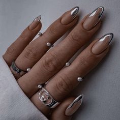 original, unique metallic silver french tip nails shaped a bit funky and not straight with dainty silver rings and pearls with white long sleeve showing in corner Silver Tip Nails, Metallic Nails Design, Manicured Nails, Tip Nails, Metallic Nails