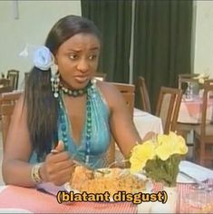 a woman sitting at a table with food in front of her and the caption that reads, blatt't discuss