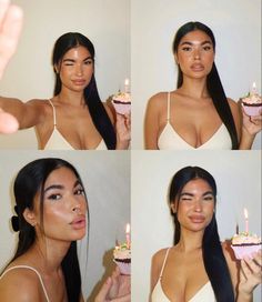 the woman is holding a cupcake with candles in her hand and posing for pictures