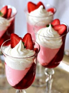 strawberry trifle in small glasses with whipped cream and strawberries