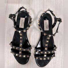 Size 37. Great Condition. Edgy Black Sandals With Studs, Edgy Black Studded Sandals, Black Studded Sandals For Evening, Edgy Sandals With Studded Rubber Outsoles For Party, Edgy Party Sandals With Studded Rubber Outsoles, Chic Black Sandals With Studs, Valentino Rockstud, Valentino Shoes, Black Sandals