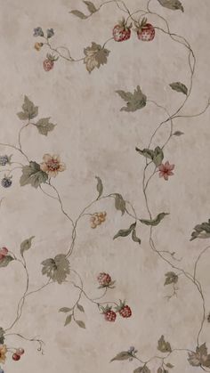 a wallpaper with flowers and leaves on it