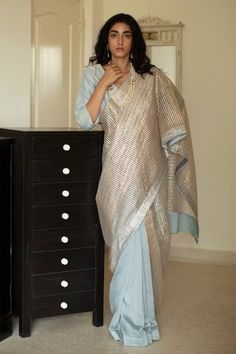 Aqua blue saree with gota embroidered stripes and contrast border.
Component: 1
Embroidered
Fabric: Net, Chanderi
Color: Blue
Note: Blouse worn by the model is not for sale - Aza Fashions Saree Blue, Sari Design, Chanderi Saree, Sari Dress, Saree Designs Party Wear, Saree Blouse Designs Latest, Blue Saree, Saree Trends, Elegant Saree