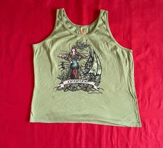 Beautiful Amy Brown fairy core tank top. - Size: XL In good condition Please review images for measurements and other details. The item you see is the item you will receive. All items come from a smoke and pet free environment. Amy Brown Fairies, Brown Fairy, Amy Brown, Green Tank Top, Green Tank, Fairy Core, Vintage Tops, Womens Tank, Womens Clothing Tops