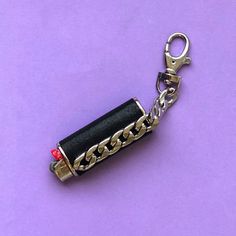 Make it chain and spark it up! Never lose your lighter again with an attachable clasp and a replaceable lighter function.   *Handmade in Los Angeles *Genuine Leather *18K gold plated or Sterling Silver Plated *Available in Vegan Leather upon request. Just leave a note in the "special instructions" box at checkout 💚 Cool Lighters, Lighter Case, Lip Ring, Puff And Pass, Look At You, Los Angeles California, Handcrafted Jewelry, Make It, Vegan Leather