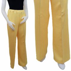 Vintage yellow houndstooth print high-waisted pants from the 60's or 70's. Soft and stretchy fabric. Features a straight-leg silhouette and a loose, relaxed fit. The waistband is elastic. No pockets. BRAND: Beeline Fashions Made in USA SIZE: Tag reads: Size 16 Please see measurements! CONDITION: Great vintage condition. There are a couple of faint stains on the front left leg. (See pics. Please ask for additional pictures if needed!) MEASUREMENTS: Waist (elastic waistband): 28-32 in. Hips (appro 60s Pants, Seventies Fashion, Yellow Fashion, Vintage Yellow, Stretchy Fabric, Straight Leg Pants, High Waisted Pants, Bell Bottoms, Vintage 70s