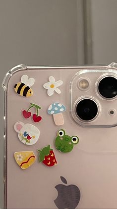 an iphone case with some stickers on it