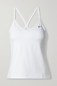 Nike's 'Indy' tank is perfect for low-impact workouts like walking and Pilates. Designed with lightly padded cups, it's made from the label's Dri-FIT fabric and blended with 72% recycled-polyester. Wear it with your favorite leggings.<br><br>This product Reduces Waste. Find out more about NET SUSTAIN <a href="https://www.net-a-porter.com/en-gb/campaigns/net-sustain">here.</a> Tank Tops Athletic, Fitted Workout Tops, Nike Tennis Clothes, Nike Clothes Women, Gym Outfit Summer, Track Clothes, Tennis Fits, Sporty Clothes, White Activewear