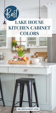 a kitchen island with two stools in it and the words best lake house kitchen cabinet colors