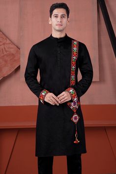 Illuminate your Navratri nights with the enchanting allure of our Jade Black Kutch Work Kurta Set. Made from super-soft premium cotton, it exudes a subtle sheen, while intricate Kutch work patches enhance its designer appeal. Ideal for your dandiya nights during Navratri, this ensemble promises comfort and sophistication in one perfect package. Fabric: 100% Premium Cotton Thread Embroidery . Limited quantity, Seasonal collection. We change our fashion very frequently. Grab it before it disappear Navratri Outfits For Men, Cotton Thread Embroidery, Desi Fits, Designer Kurta, Kutch Work, Boys Kurta, Diy Embroidery Patterns, Men's Outfits