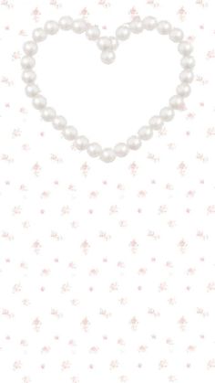 a heart shaped pearl necklace on a white background with pink flowers and stars around it