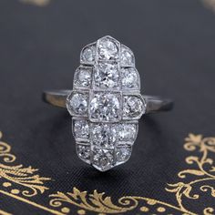 This ring is full of Edwardian charm, with its romantic lines! The diamonds all have great makes to them and oh-so sparkly on the finger too. A great ring to add to one's daily jewelry suite as the ring has just enough bling for both day and night wear yet not nearly as big and bold as most dinner rings. Platinum, size 7, and fully sizable.Diamonds are G/H/I colors, SI clarities.Please see qualitative report for more information. Dinner Rings, Romantic Lines, Modern Mens Rings, Art Jewelry Earrings, Dinner Ring, Daily Jewelry, Antique Watches, Antique Engagement, Night Wear