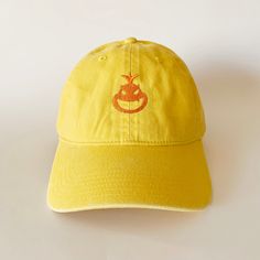 100 % Cotton.  One size fits most with an adjustable buckle strap closure. Adult / Unisex Thick ,Soft , and light material. Very nice quality built hats with quality embroidery work. Adjustable Yellow Dad Hat Visor, Yellow Adjustable Visor Dad Hat, Yellow Baseball Cap With Embroidered Logo, Yellow Adjustable Baseball Cap With Curved Visor, Yellow Curved Brim Baseball Cap With Embroidered Logo, Adjustable Yellow Fitted Hat With Curved Brim, Mario Cap, Bowser Jr, Embroidered Cap