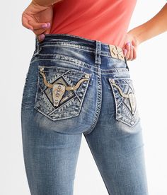 Miss Me Mid-Rise Boot Stretch Jean - Blue 33/34, Women's M898 Mid-rise Slim through the hip and thigh 18 bottom opening Rhinestones on embroidered back pockets Destruction details. This quality denim is hand-finished for a unique look. It will wear like your favorite jeans, with each hole and tear continuing to destruct over time. You will love the comfort of this denim that has the look and feel of years of wear. . 73% Cotton 24% Polyester 3% Elastane. Machine wash in cold water separately insi Western Clothing For Women, Bedazzle Jeans, Country Girl Jeans, Buckle Jeans Women, Fitted Mid-rise Jeans With Rhinestones, Miss Me Flare Jeans, Cowboy Jeans, Flared Miss Me Jeans