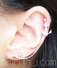 an ear with a chain and anchor on it