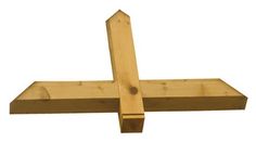 a wooden cross is shown against a white background