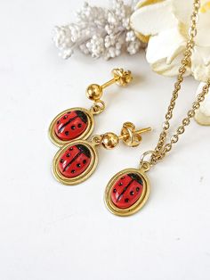 "Lovely ladybug set (or choose just one piece) made of unused true vintage components:  60s German glass cabochon with two options of closure: gold plated brass ball studs, or/and hypoallergenic lever backs (not gold plated).   Ladybug measures 6x8mm and sits on a cute framed raw brass setting.   The necklace has a contemporary gold plated chain and measures 16\" + 2\" of extender = 40cm + 5 cm of extender.  ★ALL THE JEWELRY in the shop is from old vintage wharehouse, or handmade with unused vin Ladybug Insect, Ladybug Earrings, Button Earrings, Earrings Red, Red Polka Dot, Vintage Button, Lady Bug, Gold Plated Chains, Raw Brass