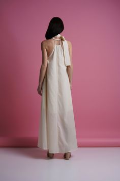 "A light summer dress featuring maxi length, tie neck , and open shoulders. - tie neck - open shoulders - sleeveless - matching fabric belt - long skirt - a-line silhouette - lined Fiber: 100 % cotton Color: milky white For size S: length- 55\" (140 cm) Our model wears size S (US 6) and is 177cm/5'9\" tall. You may feel free choosing the size. Just send us your measurements (bust, waist, hips, height). We will define your correct size. MORE DRESSES: https://www.etsy.com/shop/TAVROVSKA?ref=hdr_sh Summer Wedding Halter A-line Dress, Beige Halter Neck Summer Maxi Dress, Summer Wedding Halter Neck Dress, Cream Sundress Maxi Dress For Summer, Cream A-line Maxi Dress For Summer, Summer Floor-length Halter Dress With Tie Back, Summer A-line Maxi Dress With Tie Back, Spring A-line Maxi Dress With Tie Back, A-line Tie Back Maxi Dress For Vacation