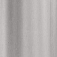 a white wall with vertical lines on it