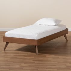 Baxton Studio Lissette Mid-Century Modern Ash Walnut Finished Wood Twin Size Platform Bed Frame FredCo theFredCo Walnut Bed Frame, Walnut Bed, Wood Platform Bed Frame, Modern Platform Bed, Twin Platform Bed, Solid Wood Platform Bed, Twin Bed Frame, Wood Platform Bed, Baxton Studio