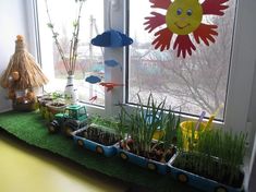 a window sill filled with lots of plants