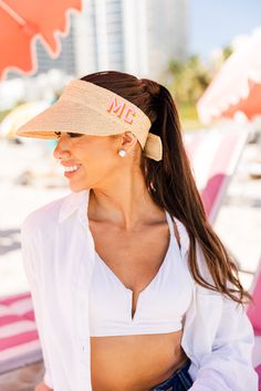 The Embroidered Straw Visor is the perfect mix of practical and stylish! Trendy Summer Visor Sun Hat, Summer Visor Sun Hat, Trendy Straw Hat For Sunbathing, Beachy Spring Visor Hat, Beachy Visor Hats For Spring, Adjustable Visor Straw Hat For Summer, Trendy Straw Visor Hat For Vacation, Straw Visor Hat For Summer, Spring Beach Straw Visor