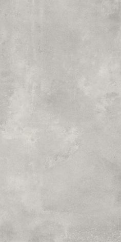 a white and gray concrete wall textured with light grey paint or cement, for use as a background