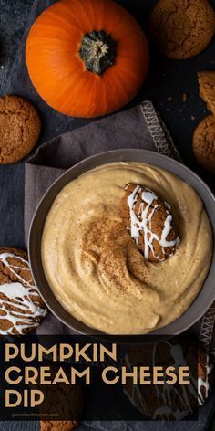 pumpkin cream cheese dip in a bowl surrounded by cookies