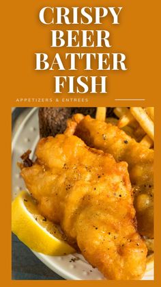 crispy beer batter fish on a white plate with lemon wedges and french fries