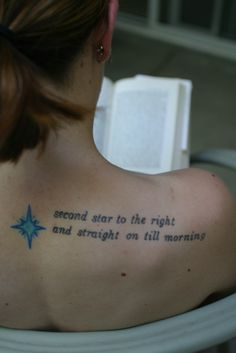 a woman with a tattoo that reads, second star to the right and straight on all morning