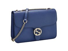 Elevate your look with the Gucci Dollar Interlocking GG Blue Leather Medium Chain Shoulder Bag. Crafted with precision and style, it features a striking blue pebbled leather and the iconic GG flip-lock clasp. Practical yet glamorous, its spacious interior keeps your essentials organized while the sliding chain strap allows versatile styling options. Perfect for any occasion, this bag effortlessly enhances any outfit, making a lasting impression wherever you go. Treat yourself to timeless luxury Blue Shoulder Bag With Cc Turnlock Closure, Blue Leather Shoulder Bag With Cc Turnlock Closure, Chic Blue Bag With Cc Turnlock Closure, Classic Blue Shoulder Bag With Chain Strap, Luxury Blue Bag With Chain Detail, Luxury Blue Bags With Chain Detail, Blue Gucci Shoulder Bag For Formal Occasions, Luxury Blue Bags With Chain, Luxury Blue Chain Bags