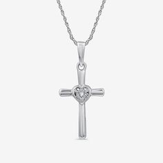 Celebrate your faith with our Women�s Diamond Accent Cross Pendant Necklace in sterling silver. This beautifully crafted piece features a stunning cross pendant adorned with a sparkling natural diamond, showcasing a rounded carat weight of less than 1/10 ct. t.w. The pendant measures 24.4mm in length and 11.9mm in width, suspended from an 18-inch rope chain with a secure spring ring clasp. Packaged in a lovely gift box, this necklace makes a meaningful gift for special occasions or a heartfelt a White Gold Cross Charms For Anniversary, Spiritual Sterling Silver Cross Necklace For Anniversary, Sterling Silver Cross Jewelry For Anniversary, Sterling Silver Cross Pendant Necklace For Anniversary, Sterling Silver Cross For Anniversary, Sterling Silver Cross Charms For Anniversary, Mother's Day Cross Pendant Jewelry, Sterling Silver Cross Necklaces For Mother's Day, Silver Cross Jewelry For Mother's Day