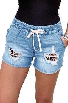 Distressed Leopard Patchwork Denim Shorts Casual Distressed Jean Shorts, Distressed Denim Blue Jean Shorts, Distressed Stretch Jean Shorts In Medium Wash, Stretch Distressed Medium Wash Jean Shorts, Medium Wash Stretch Distressed Jean Shorts, Casual Distressed Denim Blue Jean Shorts, Casual Distressed Denim Blue Shorts, Casual Ripped Medium Wash Shorts, Casual Light Wash Stretch Jean Shorts