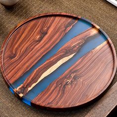 a wooden plate sitting on top of a table