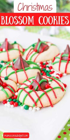 christmas blossom cookies on a white plate